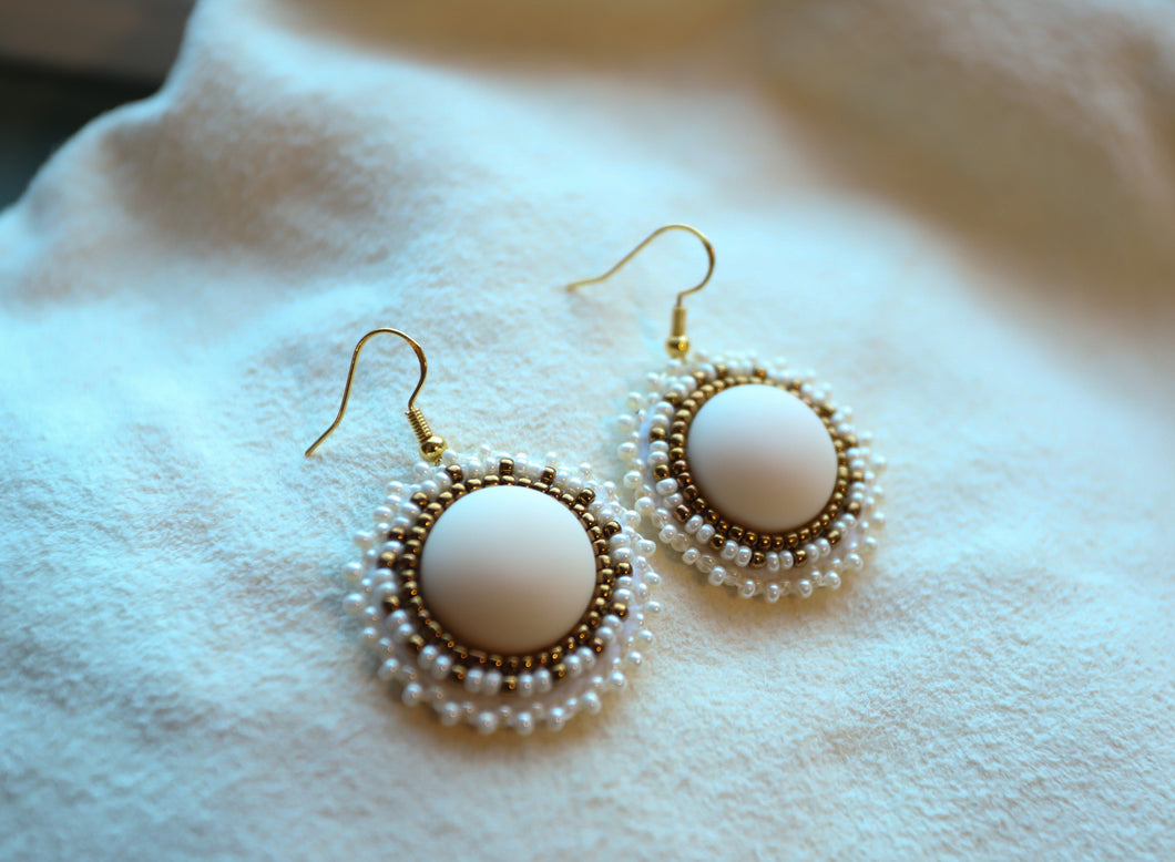 White beaded earrings